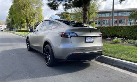 Tesla Model Y wrapped in 3M Matte grey Aluminum 12