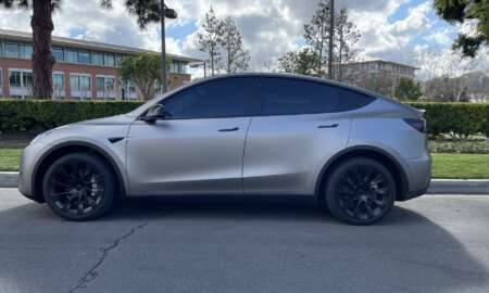 Tesla Model Y wrapped in 3M Matte grey Aluminum 13