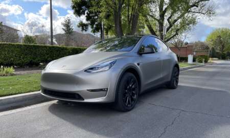 Tesla Model Y wrapped in 3M Matte grey Aluminum 7
