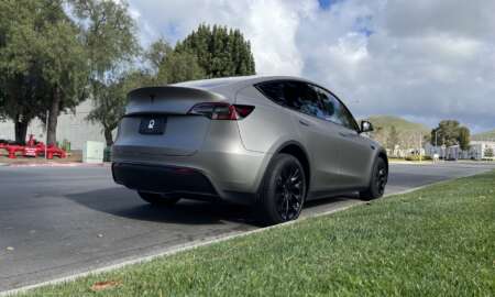 Tesla Model Y wrapped in 3M Matte grey Aluminum 9